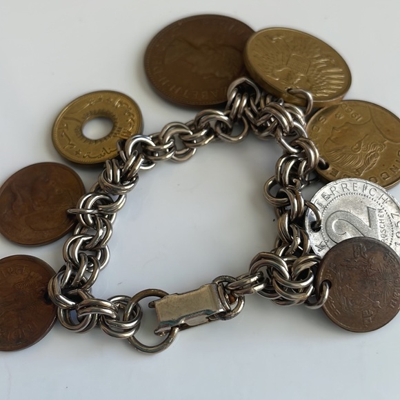 Vintage coin charm bracelet with various European coins on a silver tone chain - Picture 10 of 12